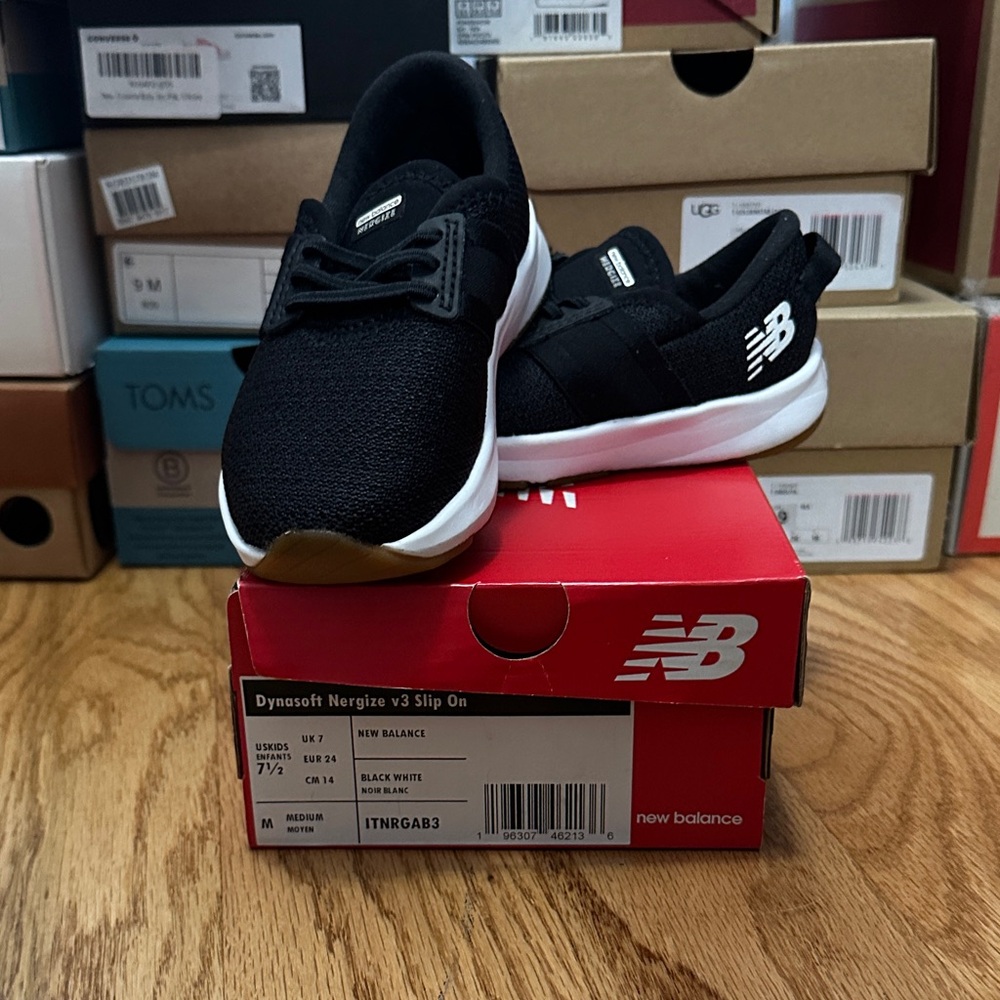 New Balance Kids Black and White Slip-On Sneakers